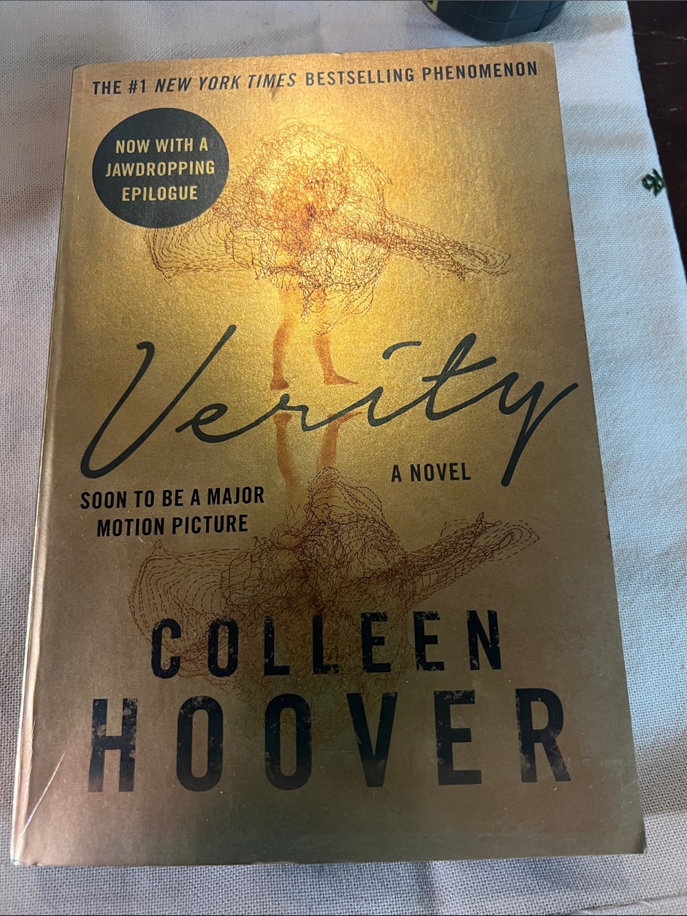 Verity Paperback Book - Gold